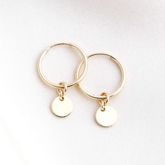 Tiny Coin Hoops | Simple & Dainty 14k Yellow Gold Filled Dangle Cartilage Earrings, 14k Gold-filled Yellow Gold Cartilage Earrings, 14k Gold Filled Charms Drop Earrings, Hypoallergenic 14k Gold Filled Dangle Huggie Earrings, Gold Huggie Earrings With Dangling Charms For Everyday, 14k Gold Filled Drop Earrings With Charms, Minimalist 14k Gold-filled Cartilage Earrings, 14k Gold Filled Gold Cartilage Earrings, 14k Yellow Gold Filled Dangle Huggie Earrings