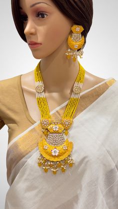 Yellow Kundan long necklace/Indian jewelry/Kundan rani haar/Mala necklace set/Indian Wedding/Bridal Necklace/Punjabi Jewelry/Pakistani  This is 100% Handmade jewelry. So Color, shades, texture displayed may slightly vary from the actual product due to digital image limitations. We request you to consider these minor variations. Please expect the possibility of some slight imperfections when buying handmade jewelry. If you have any questions, please message or email us. Arrives in a gift box. Ple Traditional Yellow Cutdana Jewelry, Yellow Festive Jewelry For Puja, Bollywood Chandbali Jewelry Sets For Puja, Bollywood Style Kundan Mala For Puja, Chandbali Bridal Necklace For Diwali Puja, Bridal Chandbali Necklace For Diwali Puja, Long Kundan Necklace For Ceremonial And Festive Occasions, Bollywood Chandbali Bridal Necklace For Puja, Traditional Yellow Temple Necklace For Diwali