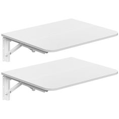 two white tables sitting next to each other