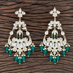 Gorgeous Earrings. Each piece is handcrafted . All the raw material used in this product is of high quality and is handcrafted with love. Height = 125 mm || Width = 65 mm Bollywood Look Indo Western Earring 100% Satisfaction Guarantee: Long Lasting Plating, High-Quality Stones. Gifting: This pair of earrings come in a beautiful gift pack , making it an ideal gift for birthday, wedding anniversary or wedding gift. Occasion: Perfect choice for any Indian occasion. Care: It is advisable that you ke Green Meenakari Bridal Earrings For Formal Occasions, Green Meenakari Chandelier Earrings For Diwali, Green Bollywood Chandelier Earrings With Meenakari, Festive Green Kundan Chandelier Earrings, Western Earring, Green Meenakari Chandelier Earrings, Mint Earrings, Earrings Chandelier, Western Earrings