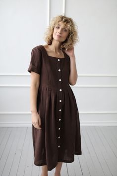 Fitted Button-up Linen Dress, Fitted Linen Dress With Buttons, Fitted Linen Dress With Button Closure, Brown Summer Dresses With Buttons, Brown Dresses With Button Cuffs, Brown Buttoned Summer Dresses, Elegant Short Sleeve Linen Dress With Buttons, Elegant Brown Linen Summer Dress, Elegant Brown Linen Dress For Summer