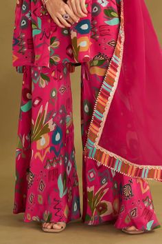 Hot pink gathered short anarkali with ikat, floral print and gold embroidery in front and sleeves. Paired with printed sharara and border printed dupatta. - Aza Fashions Short Anarkali, Printed Sharara, Printed Dupatta, Sharara Set, Gold Embroidery, Border Print, Fashion App, Floral Short, Floral Print Shorts