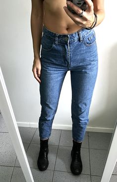 It's a Vintage 90s blue classic girlfriend cropped casual jeans. Zip fly. The high waisted. Taper leg. Not stretchy. Condition: Great vintage condition. Material: 100% cotton. Size: S. Model's height: 5.7 / 178 cm / Size S. MEASUREMENTS: Waist doubled: 26 inch / 68 cm. Hips doubled: 35 inch / 90 cm. Front rise: 10,5 inch / 27 cm. Inseam: 26 inch / 67 cm. Length: 36 inch / 92 cm. Worldwide shipping. Shipping takes to: USA 7-14 days.  EU 4-7 days. Others countries 7-14 days. High Rise Mom Fit Denim Blue Bottoms, Medium Wash Cropped Leg Mom Fit Bottoms, Medium Wash Mom Fit Cropped Bottoms, High Rise Blue Mom Fit Bottoms, Blue Mom Fit Cropped Jeans With Five Pockets, High Rise Mom Fit Blue Bottoms, High Rise Mom Fit Cropped Jeans, Denim Blue High Rise Mom Jeans, Denim Blue High-rise Mom Jeans