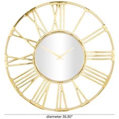 a gold clock with roman numerals and a mirror on the front, isolated against a white background