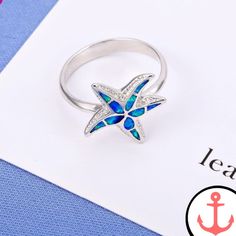 Introducing the Blue Starfish Ring: The Perfect Symbol of the Sea As passionate sea lovers, we are always on the hunt for beautiful and meaningful pieces of jewelry that reflect our deep connection to the ocean. That's why we are thrilled to present the Blue Starfish Ring—a stunning piece that captures the essence of the sea in every detail. Whether you're a seasoned sailor or simply someone who appreciates the beauty of marine life, this ring is the perfect addition to your collection. Our Star Ocean-inspired Sterling Silver Starfish Jewelry, Ocean-inspired Promise Ring, Ocean-inspired Starfish Jewelry In Ocean Color, Ocean-inspired Starfish Jewelry, Blue Sterling Silver Starfish Jewelry, Ocean-inspired Blue Ring For Gifts, Ocean-inspired Blue Ring For Gift, Ocean-inspired Blue Rings As Gifts, Blue Ocean-inspired Jewelry For Anniversary