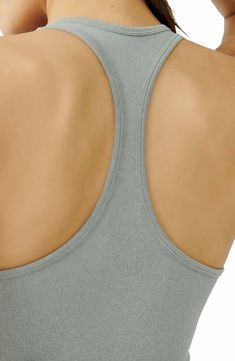 Lounge or layer in this oh-so-versatile ribbed crop top that looks (and feels) great wherever you go. 17" length (size Medium/Large) Crewneck Sleeveless Racerback 92% nylon, 8% spandex Machine wash, dry flat Imported Ribbed Scoop Neck Sports Bra, Ribbed Scoop Neck Crop Top For Yoga, Ribbed Scoop Neck Sports Bra In Athleisure Style, Athleisure Ribbed Scoop Neck Sports Bra, Everyday Cropped Seamless Crop Top, Everyday Seamless Cropped Top, Seamless Construction Crop Top, Ribbed Crop Top For Loungewear, Casual Ribbed Scoop Neck Activewear