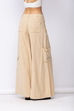 Final Sale - Get it before it's gone! Style the Cape May Beige Linen Wide-Leg Pants with your favorite summer top for a chic summer look! Linen blend fabric shapes these wide-leg pants with side cargo pockets and back patch pockets. DETAILS & CARE 70%Viscose, 30% Linen Machine Wash Cold. Imported. Summer Wide-leg Parachute Pants With Pockets, Casual Linen Pants With Multiple Pockets, Beige Linen Cargo Bottoms, Wide Leg Harem Pants With Pockets For Beach, Summer Beach Parachute Pants With Pockets, Linen Wide Leg Parachute Pants With Side Pockets, Wide Leg Linen Parachute Pants With Side Pockets, Summer Full-length Cargo Pants With Multiple Pockets, Relaxed Fit Wide Leg Harem Pants With Cargo Pockets