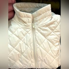 Light Weight Women’s Columbia Jacket. White Quilted Jacket For Spring, White Puffer Quilted Jacket For Winter, White Quilted Puffer Jacket For Winter, Cream Quilted Winter Outerwear, White Quilted Winter Jacket For Cold Weather, Winter White Quilted Jacket For Cold Weather, White Quilted Jacket For Winter Cold Weather, Casual Quilted Winter White Outerwear, Casual Quilted Outerwear In Winter White