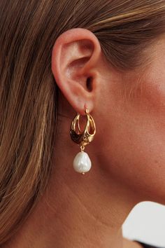 Drop earrings Latch closure Embrace the timeless allure of pearls with our Serotonin drop earrings. These earrings are sure to effortlessly elevate any outfit - whether you're attending a formal event or adding a touch of elegance to your everyday attire. MATERIAL 14K GOLD PLATED STAINLESS STEEL/ FRESHWATER PEARL Drop Pearl Earrings, Pearl Earrings Gold, Gold Pearl Earrings, Beautiful Style, Pearl Drop Earrings, Earrings Gold, Formal Event, All Rights Reserved, Freshwater Pearls