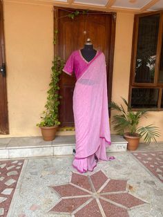 pink buti Chiffon silk saree with hand embroidery blouse |modern silk saree with readymade blouse | sarees USA | pure light weight silk saree / pink saree with blue stitched blouse / voggish / elbow sleeve maggam blouse      you are absolutely gonna fall in love with this unique modern  saree look with our stitched ready to wear blouses(includes the price) with a modern touch to them is perfect for your upcoming saree occassion that really makes you stand apart in crowd !!     You dont really ne Pink Silk Bollywood Pre-draped Saree, Pink Pre-draped Tissue Silk Saree With Unstitched Blouse, Pink Pre-draped Saree With Dupatta In Tissue Silk, Pink Tissue Silk Pre-draped Saree With Unstitched Blouse, Designer Pink Pre-draped Saree With Zari Work, Pink Embroidered Cotton Silk Pre-draped Saree, Pink Silk Pre-draped Saree With Cutdana, Unstitched Pink Saree For Wedding, Pink Tissue Silk Pre-draped Saree For Festivals