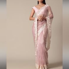 This Piece Is A Saree. Comes With Stitched Blouse . It Is Size 36 Which Is Medium In Women . It Is Not Pre Stitched . Fabric .Satin . Very Light Weight And Beautiful Saree. Wore Just For An Hour For Nikkah / Wedding .Comes With Pink Peticoat. Elegant Cotton Silk Blouse With Sheer Dupatta, Pre-draped Organza Saree With Pallu, Organza Pre-draped Saree With Pallu, Designer Wear Pre-draped Organza Saree, Designer Organza Pre-draped Saree, Eid Cotton Silk Pre-draped Saree, Fitted Silk Blouse With Sheer Dupatta, Elegant Art Silk Blouse With Sheer Dupatta, Elegant Pink Pre-draped Saree With Chikankari Embroidery