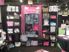 a room filled with lots of black and pink items