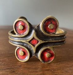 ad eBay - Super hip, quite hard to find, St Luc cuff bracelet. This renowned French modernist jewelry designer is highly collected within the jewelry world. This piece is fresh out of an incredible estate collection. The bronze cuff with enamel decoration is completely hand made and has an excellent old patina. Condition is great. One of these with blue enamel rather than red just sold on 1stDibs for $475. Screenshots at end of listings photos show this example and a few others. This cool… Vintage Spoon Jewelry, Rivet Jewelry, Just Sold, Modernist Jewelry, Vintage Spoons, Spoon Jewelry, Buckle Bracelet, French Designer, Jewelry Designer