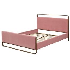 a pink bed with metal frame and headboard