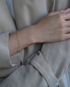 Double beaded chain layered bracelet. Modern, dainty and delicate great as an everyday bracelet from E&E PROJECT. Bracelet comes in 2 beaded satellite chain strands, wear it alone or layered with other bracelets. Gold filled or Sterling Silver Everyday Tiny Beads Chain Bracelet, Adjustable 14k Gold Filled Bracelets With Satellite Chain, Minimalist Multi-strand Satellite Chain Jewelry, Elegant Tiny Beads Jewelry For Everyday, Elegant Everyday Jewelry With Tiny Beads, 14k Gold Filled Beaded Bracelets With Tiny Beads, Dainty Jewelry With Beaded Chain For Layering, Dainty Beaded Chain Jewelry For Layering, Everyday Double Chain Bracelet