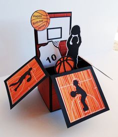 an origami basketball card in a box