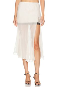 100% silk.  Made in USA.  Dry clean only.  Partially lined.  Pull-on styling with elastic waistband.  Crepe fabric overlay with satin fabric and lace trim.  Item not sold as a set.  .  .  .  .  .  .  .  .  . Feminine Silk Bottoms For Evening, Elegant Sheer Tiered Skirt, Elegant Sheer Skirt, Elegant Sheer Skirt For Spring, Chic Sheer Flared Skirt, Summer Silk Bottoms With Bias Cut, Elegant Bottoms With Lace Trim For Night Out, Summer Silk Bias Cut Bottoms, Elegant Silk Skirt With Lace Trim