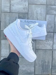 Blinged out bridal Air Force 1 sneakers personalized for the brides special day 👰🏻 **PLEASE READ LISTING CAREFULLY**  SNEAKERS: This listing if for Nike Air Force 1, if you would like something different please message me :) Personalization section please add: *your name  *date of wedding *if you want them without any customization please type (no customization) NOTE: A proof of your lettering will be sent to you within 72 hours of purchasing, please check your messages to approve image. If seller does not hear back within another 48 hours will proceed with shoes accordingly.  Price breakdown: *Full Shoe $290      -This option includes all white pearls on 4 Nike symbols both inner and outer sides, back heel and front toe area as shown in photos. This option is with regular laces. Name & Bride Sneakers Wedding Nike, White Bridal Sneakers, Wedding Air Force Ones, Air Force 1 Wedding, Sneaker Wedding, Wedding Tennis Shoes, Air Force Wedding, Bride Sneakers, Wedding Shoes Sneakers