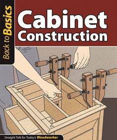 a book cover showing a person working on an object with the words cabinet construction written below