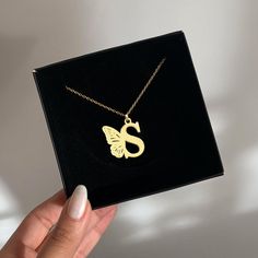 Personalize Your Style with Our Butterfly Initial Necklace. Crafted with precision and attention to detail, this necklace is the perfect way to showcase your personal style. Metal: Stainless Steel Available in a variety of finishes: 🌹 Rose Gold 🟡 18k Gold 🥈 Silver The chain length options include: - 16" - 18" - 20" - 22" Each necklace is meticulously: ✨ Designed ✨ Polished ✨ Assembled Please note: All our items come with a 5 cm/2" extension chain. so don't hesitate about the size!! * 14" NECK Gold Initials Name Necklace For Mom, Gold Initials Name Necklace As Gift For Mom, Gold Initial Necklace For Mother's Day, Gold Initial Necklace As Mother's Day Gift For Her, Gold Initials Charm Necklace For Mom, Gold Initials Charm Necklace As Gift For Mom, Gold Initials Jewelry As A Gift For Mom, Gold Name Necklace With Initial Pendant For Mom, Personalized Gold Initial Necklace For Mom