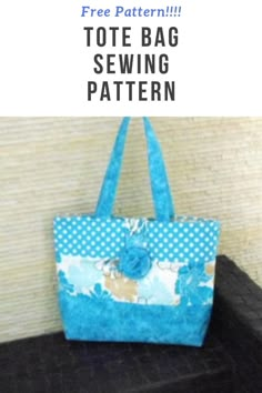 a blue and white tote bag sitting on top of a black table with the words free pattern