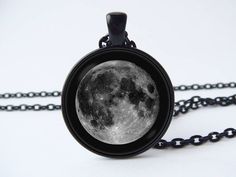 Lunar necklace Girlfriend gift Moon pendant Gray moon Lunar jewelry Full moon jewelry Moon jewellery Moon necklace Moon gift Moon phasesIn the options you can choose: Style, Metal color and Engraving.Jewelry is made up of metal base, chain or key ring, glass lens and image.Pendant size: 1 inch (2.5cm).If you chose in the option "+Engraving", please write the text, words or date for engraving. This text will be engraved on the back of the product.I will place the text in one or more lines, depend Celestial Black Moon Phase Jewelry, Black Celestial Moon Phase Jewelry, Black Moon Phase Round Pendant Jewelry, Black Moon Charm Round Pendant Jewelry, Circle Moon Charm Necklace For Gift, Black Moon Charm Jewelry For Gift, Black Round Pendant Jewelry With Moon Charm, Moon Print Moon Shaped Necklace Gift, Moon Print Moon-shaped Necklace Gift