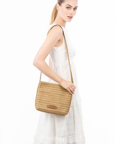 A women's designer crossbody bag for sale online of woven raffia with top zipper closure is super cute for use throughout spring-summer months. The textured weave is intricate with its long strap extending down the sides of the bag body. The mid-size rectangular shape is soft and squishy and feels body friendly. A roomy outer pocket on reverse is for easy access to phone or glasses. Inside: durable cotton canvas lining, sidewall zipper compartment and roomy patch pocket. Dimensions: Front and ba Beige Braided Crochet Bag, Casual Braided Rectangular Bucket Bag, Spring Casual Woven Bucket Bag, Casual Woven Bucket Bag For Spring, Casual Straw Shoulder Bag For Spring, Casual Spring Bucket Bag With Braided Handles, Casual Spring Woven Bucket Bag, Casual Woven Satchel Shoulder Bag, Casual Satchel Shoulder Bag For Spring