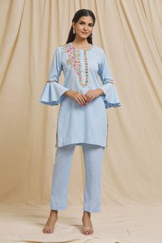 Blue linen cotton kurta with multi-colored floral, thread and mirror hand embroidered yoke. Comes with straight pant.
Components: 2
Pattern: Hand embroidered
Type Of Work: Floral, Thread, Mirror
Neckline: Round
Sleeve Type: Bell Sleeves
Fabric: Linen cotton
Color: Blue
Other Details: 
Side slits on kurta
Occasion: Puja - Aza Fashions Blue Kurta, Cotton Kurta, Women Kurta, Straight Kurta, Pant Set, Straight Pants, Set For Women, Aza Fashion, Bell Sleeve