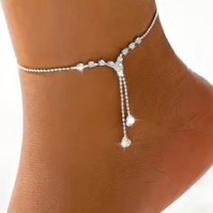 Elegant Silver Toned Anklet With Simulated Diamonds. The Anklet Also Features Two Ball Chain Tassels With Dangling Simulated Diamonds. Approx. 7.5” In Length With A 2.25” Extension Also Available In Gold Toned See My Other Listings For More Jewelry. Bundle And Save On Shipping. #A38 Elegant Metal Anklets For Party, Elegant Metal Party Anklets, Silver Metal Anklets For Party, Dangle Anklets For Parties, Adjustable Elegant Dangle Anklets, Elegant Adjustable Dangle Anklets, Game Of Thrones Necklace, Spoon Bracelet, Costume Rings