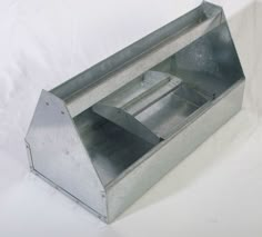 an open metal box on a white background