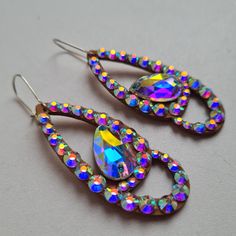 New collection of earrings! High quality of material, very shiny glass crystals, hold tight to your ears while dancing! Earrings catalog https://etsy.me/3IE3rZJ Necklace catalog https://etsy.me/3YM2jZO My profile on Linktree https://bit.ly/3JRVHEF Handmade Teardrop Chandelier Earrings For Party, Jeweled Dangle Teardrop Earrings For Party, Handmade Teardrop Crystal Earrings For Party, Party Jeweled Dangle Teardrop Earrings, Teardrop Crystal Clip-on Earrings For Party, Party Jeweled Teardrop Dangle Earrings, Handmade Teardrop Crystal Earrings, Handmade Iridescent Crystal Earrings For Party, Party Crystal Teardrop Earrings With Sparkling Stones