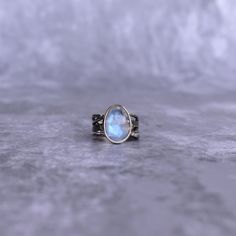 ✦ Introducing our Rose Cut Oval Shaped natural Moonstone ring: a beacon of new beginnings and cosmic beauty.  Known as the "Stone of New Beginnings," it radiates transformative energy, perfect for the free-spirited bohemian. A heartfelt gift for loved ones embarking on a journey of self-discovery. Embrace the ethereal allure of this mesmerizing gemstone, adding a touch of magic to your everyday look. 💎  Please Note As with all Natural Gemstones The colors and inclusion patterns if applicable may vary slightly. -- -- »» DETAILS -  Gemstone -  Moonstone Metal - 925 Sterling Silver  -- -- »» $ BU Y * M O R E * S A V E * M O R E $ «« ✦ Special 25% OFF when you order 2 items!! Apply Coupon Code: SAVEMORE25 ✦Special 30% OFF when you order 3 or more items!! Apply Coupon Code: SAVEMORE30 -- -- C Handmade Mystical Moonstone Crystal Ring, Handmade Moonstone Stackable Rings For Promise, Bohemian Moonstone Crystal Ring With Birthstone, Celestial Moonstone Ring With Natural Stones, Handmade Moonstone Crystal Ring For Promise, Handmade Mystical Moonstone Rings, Mystical Hand Forged Moonstone Ring For Gift, Mystical Hand-forged Moonstone Ring As Gift, Mystical Moonstone Ring As A Gift