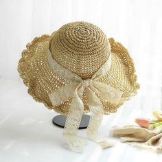 Stay cool and stylish with our natural straw hat, designed with a wide brim and scalloped edge for excellent sun protection. The lightweight and breathable material, combined with an open weave pattern, ensures maximum airflow to keep you comfortable. A delicate lace ribbon bow adds an elegant touch, while the adjustable inner band offers a secure and perfect fit. Ideal for beach outings, garden parties, and picnics, this hat provides both functionality and a feminine look for any summer occasio Casual Open Weave Sun Hat For Summer, Adjustable Summer Straw Hat With Open Weave, Spring Beach Hat With Open Weave, Spring Straw Sun Hat With Open Weave, Adjustable Open Weave Sun Hat For Beach, Adjustable Open Weave Summer Straw Hat, Summer Vacation Open Weave Straw Hat, Casual Open Weave Sun Hat For The Beach, Open Weave Summer Beach Hats