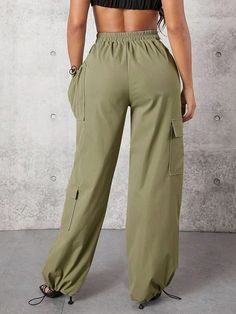 Elevate your casual style with these Solid Color Flap Pocket Drawstring Hem Cargo Pants. Crafted from high-quality woven fabric, they offer a regular fit and a flattering high waistline. The drawstring hem adds a touch of versatility to these long-length pants. Details: Style: Casual Pattern Type: Plain Type: Cargo Pants Waist Line: High Waist Length: Long Fit Type: Regular Fit Fabric: Non-Stretch Material: Woven Fabric Composition: 100% Polyester Care Instructions: Machine wash or professional High Waist Solid Color Sweatpants With Drawstring, High Waist Sweatpants With Drawstring, High-waist Sweatpants With Drawstring, High Waist Relaxed Fit Bottoms With Drawstring, Spring Cargo Pants With Drawstring, Baggy High Waist Parachute Pants With Drawstring, Spring Cargo Pants With Drawstring And Loosely Fitted Hips, Trendy Cotton Drawstring Bottoms, Cotton High Waist Sweatpants With Drawstring