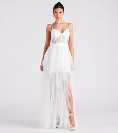 Dial up your inner bombshell in the ravishing Ashlie formal dress to make a dramatic entrance as a sexy bride or a black-tie gala guest! She features a sleeveless sweetheart neck, adjustable spaghetti straps, a sheer lace corset bodice, short skirt lining, sassy sheer mesh ruffled overlay and a high side slit design. Corset Ruffle Dress, Bachelorette Las Vegas, Long Hoco Dresses, Flowy Long Dress, Wedding Lace Dress, Platform Stiletto Heels, Dramatic Entrance, Flowy Dress Long, Prom Dress Shoes