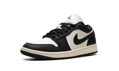 The Women’s Air Jordan 1 Low "Vintage Panda" is the women’s sizing version of the retro basketball shoe in the popular “Panda” colorway, but with a vintage-inspired twist.  An original Jordan 1 colorway from 1985, the “Panda” or “Black/White” style is one of the most popular looks for Michael Jordan’s first signature shoe.  Here, the “Vintage Panda” updates the theme by paying homage to its roots with pre-aged details.  The upper is complete with a cream white textile base and black leather over Panda Shoes, White Textile, Retro Basketball Shoes, Retro Basketball, Wings Logo, Stadium Goods, Air Jordan 1 Low, Jordan 1 Low, Black White Fashion