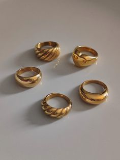 We offer chunky gold rings at affordable prices. Since chunky rings are so popular, I made a special collection for them. Large dome rings, chunky croissant rings, double dome rings, chunky love rings. As a beautiful stainless steel-based gold band, it lasts forever and will always look good. A single ring is stylish enough, but a couple does look very fancy together. ♥ SIGN UP for 10% OFF your first order: https://bit.ly/3olIlWf ♥ DETAILS - Materials: Stainless steel, 18k gold plating. - Nickel Chunky Gold Pinky Ring, Bulky Rings Women, Chunky Jewelry Rings, Gold Thick Ring, Gold Rings Thick, Chunky Gold Rings Vintage, Thick Rings For Women, Classy Gold Rings, Gold Ring Chunky