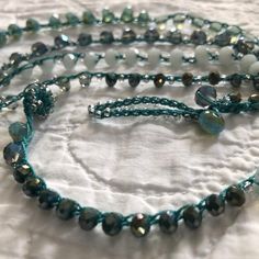 Aqua blue ombre faceted iridescent blue crystal and silver | Etsy Sewing Beads, Crochet Beaded Necklace, Smoky Blue, Iridescent Blue, Beaded Wrap Bracelets, Crochet Sewing, Beaded Wraps, Silver Line, Tiny Flowers