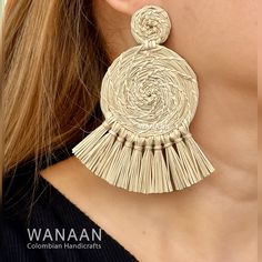 Iris Style Earrings / Handmade Boho Iraca Palm earrings Elevate your style with the unique beauty of handmade Colombian products. Wanaan proudly presents our handmade Iraca earrings. This is a true work of art that will leave lasting impressions and memories. These accessories are a stylish addition to your look. Skilled Colombian artisans meticulously crafted each earring using traditional techniques passed down through generations. Don't miss this opportunity to bring a piece of Colombian arti Handmade Bohemian Earrings For Vacation, Bohemian Handmade Earrings For Vacation, Bohemian Tassel Earrings For Beach, Bohemian Beige Earrings For Vacation, Beige Bohemian Earrings For Vacation, Handmade Bohemian Tassel Earrings For Beach, Bohemian Woven Earrings For Vacation, Adjustable Traditional Earrings For Beach, Traditional Earrings For Beach Summer