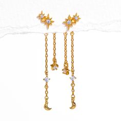 Introducing our enchanting Starry Night Dangle Earrings. With a charming 2-star stud and a dangle backing adorned with celestial detailing, this piece will have you shining as bright as the evening sky. In a beautiful fusion of dreamy design and twinkling elegance, our Starry Night Dangle Earrings will be a piece you'll constantly find yourself reaching for. Dreamy Design, Night Court, Family Jewels, Fall Earrings, Evening Sky, Necklace Chain Lengths, Celestial Jewelry, Gold Filled Earrings, Fall Jewelry