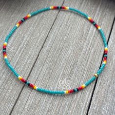 Dainty native American anklet with colorful tiny seed beads strung on a high quality latex free stretch cord. This dainty anklet looks great by itself or layered with another piece.  The anklet has no clasp, just slips over your fit and comfortably adjust to your ankle. All anklets are customizable to the size you need so please be sure to measure your ankle where you want your anklet to sit. You can choose your size from the dropdown menu. Please note: All jewelry is handmade with the Best qual Casual Turquoise Friendship Bracelets With Tiny Beads, Bohemian Green Anklets With Tiny Beads, Turquoise Beaded Anklets For Festival, Turquoise Anklets With Tiny Beads For Festival, Adjustable Turquoise Anklet With Tiny Beads, Turquoise Beaded Festival Anklets, Turquoise Round Beads Anklets For Festival, Turquoise Round Beads Anklet For Festivals, Turquoise Anklets With Round Beads For Festivals