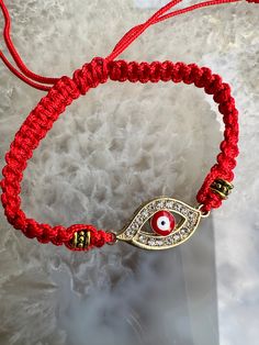 To all our girlies out there who love to be protected, we now have this beautiful adjustable Evil Eye Bracelet in Red! Red Bracelet With Adjustable Chain As Gift, Red Bracelet With Adjustable Chain For Gift, Handmade Red Evil Eye Bracelet, Adjustable Evil Eye Bracelet For Friendship, Adjustable Length Crystal Bracelet Gift, Red Adjustable Friendship Jewelry, Red Adjustable Cord Friendship Jewelry, Red Adjustable Cord Jewelry For Friendship, Bohemian Red Friendship Bracelets With Adjustable Length