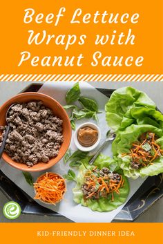 beef lettuce wraps with peanut sauce and carrots on a plate next to some lettuce leaves