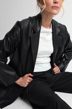 Make a statement with our Oversized Faux Leather Jacket, where edgy design meets refined luxury. This jacket is the ultimate fusion of contemporary style and effortless cool, offering a versatile piece that elevates any outfit. It features a double button front closure and front pockets. Modern Workwear Blazer, Black Single Breasted Biker Jacket For Work, Edgy Long Sleeve Outerwear For Office, Sleek Structured Workwear Outerwear, Elegant Black Leather Cropped Jacket, Modern Outerwear With Button Closure For Work, Modern Winter Outerwear For Night Out, Modern Long Coat Blazer For Work, Chic Formal Biker Jacket For Spring