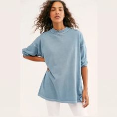 Elevate Your Wardrobe With This Stylish Free People Mock Neck T-Shirt In Blue. This Versatile Piece Features Long Sleeves And A Solid Pattern, Making It Perfect For Any Occasion. The Shirt Is Made From High-Quality Materials And Designed With A Regular Size Type For A Comfortable Fit. The Mock Neck Adds A Touch Of Sophistication To The Basic Style, And The Xs Size Ensures A Flattering Fit For Petite Frames. Whether You're Dressing Up For A Night Out Or Keeping It Casual, This Free People T-Shirt Blue Cotton T-shirt For Layering, Casual Blue T-shirt For Layering, Blue T-shirt For Summer Layering, Relaxed Blue Long Sleeve Top, Blue T-shirt For Everyday Fall Wear, Light Wash Tops For Loungewear, Spring Washed Blue Relaxed Fit Sweatshirt, Trendy Blue Tops For Loungewear, Blue Crew Neck Sweatshirt For Summer