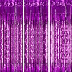 purple curtains with fringes hanging from them