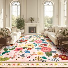 a living room filled with furniture and flowers on the rug in front of a fire place