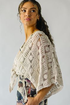 Introducing the Arata Crochet Cardigan, your new favorite piece for those breezy spring days. Made with a natural color and a playful crochet pattern, this cardigan is perfect for layering and adding a unique touch to any outfit. Stay stylish and comfortable with the Arata Cardigan! Details self: 100% cotton lining: 100% rayon Fabric Care Guide Here Sizing & Fit Measurements are approximate and taken while laying flat across the front. Not doubled. small: bust =36"; length = 12" medium: bust = 4 Bohemian Crochet V-neck Cardigan, Bohemian Crochet Top For Fall Day Out, Bohemian V-neck Crochet Cardigan, Open Knit Summer Shrug For Beach, Open Knit Shrug For Summer Beach, Fall Crochet Top For A Day Out, Summer Beach Open Knit Shrug, Lace Crochet Top For Spring Beach Cover-up, Lace Crochet Top As Beach Cover-up For Spring