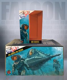 two boxed up action figures are on display