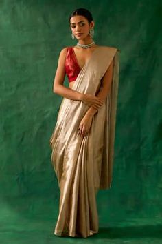 Beige and gold saree in pure zari handwoven fabric. Paired with a red chanderi handloom blouse. - Aza Fashions Tunic Designs, Silk Kaftan, Designer Jumpsuits, Blouse Models, Handwoven Fabric, Sari Fabric, Blouse For Women, Silk Jacket, Saree With Blouse